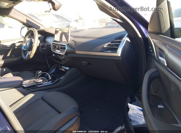 5UX33DT07R9X51868 2024 BMW X4 Blue Vista interior delantera