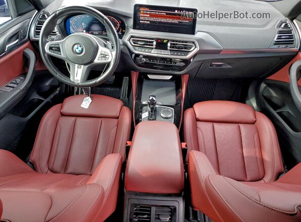 5UX33DT08N9L26010 2022 BMW X4 Blue Вид панелі приладів