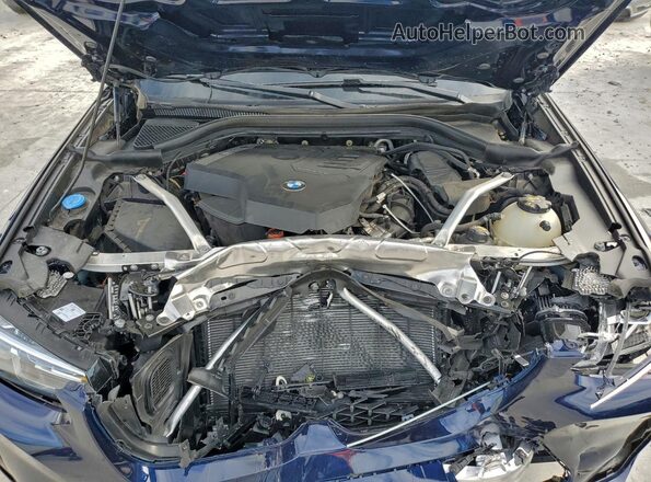 5UX33DT08N9L26010 2022 BMW X4 Blue Вид задньої частини салону