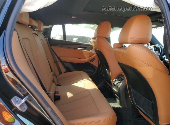 5UX33DT08R9U29532 2024 BMW X4 Black Вид задньої частини салону