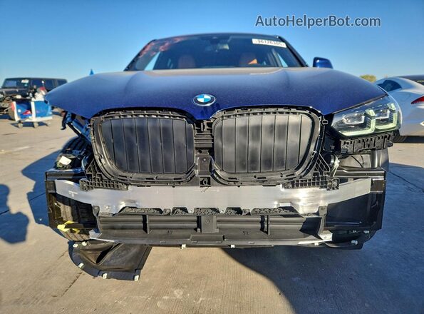 5UX33DT08S9118141 2025 BMW X4 Blue Front view
