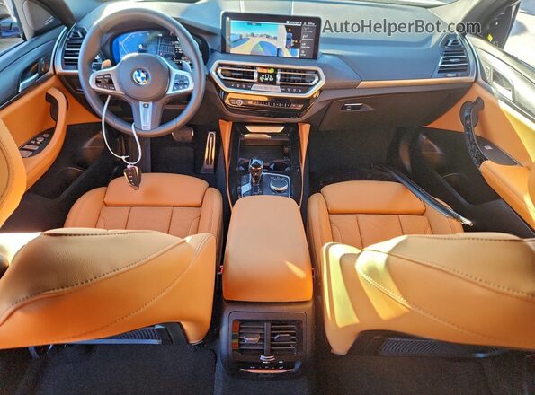 5UX33DT08S9118141 2025 BMW X4 Blue Dashboard view