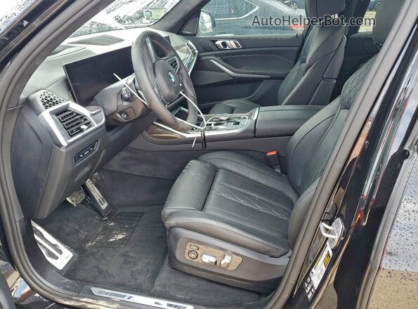 5UX33EM05S9Y48061 2025 BMW X7 Black Вид салону спереду