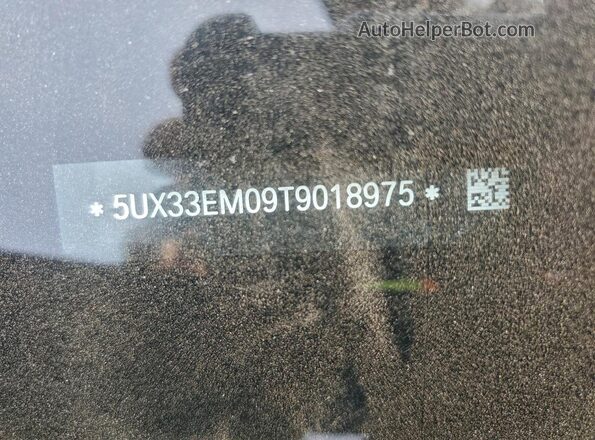 5UX33EM09T9018975 2026 BMW X7 Black Вид наклейки з VIN-кодом