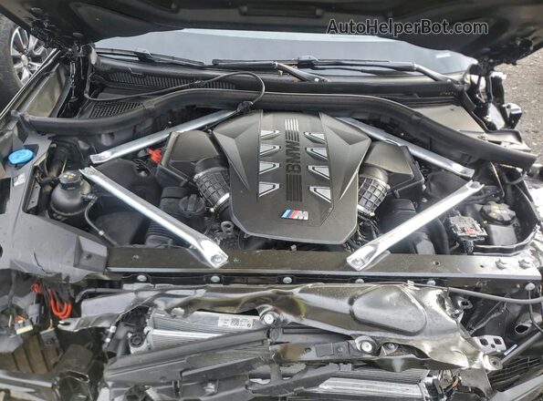 5UX33EM09T9018975 2026 BMW X7 Black Вид підкапотного простору