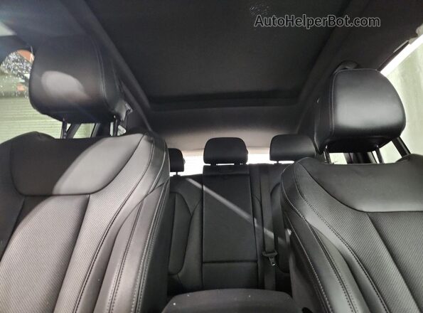 5UX43DP04R9V05830 2024 BMW X3 Gray Vista de los asientos traseros