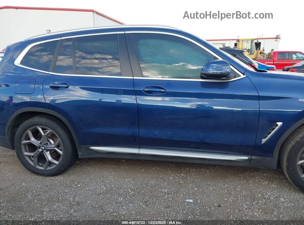 5UX43DP09N9N42642 2022 BMW X3 Синий Вид задней части салона