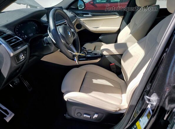 5UX43DT04P9S10245 2023 BMW X4 Black Vista interior delantera