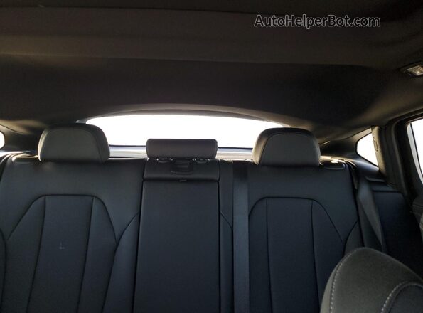 5UX43DT04S9X75328 2025 BMW X4 Black უკანა სავარძლების ხედი