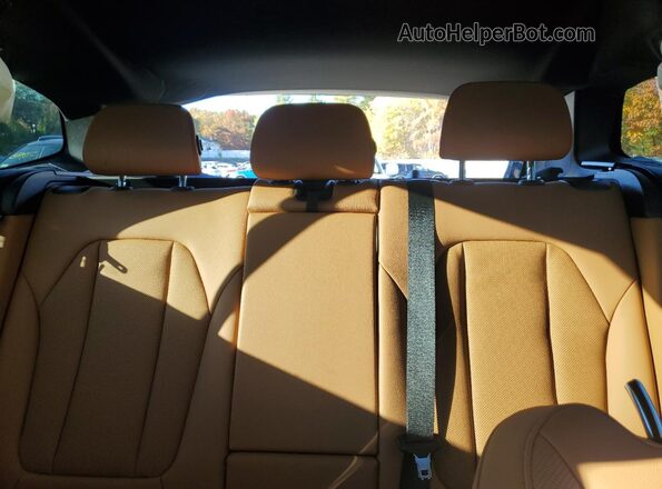 5UX53DP00P9T00071 2023 BMW X3 Blue Rear seats view