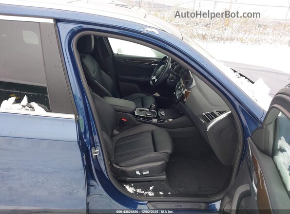 5UX53DP02N9L25664 2022 BMW X3 Blue Vista interior delantera