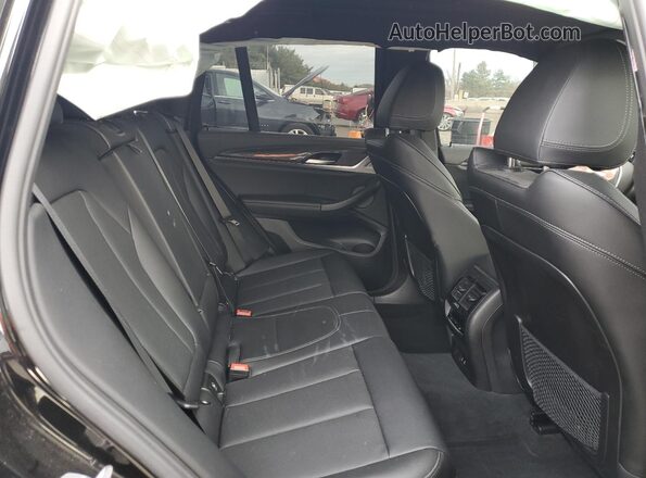 5UX83DP07R9V27421 2024 BMW X3 Black Вид задньої частини салону