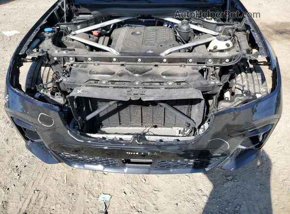 5UXCW2C03M9H54063 2021 BMW X7 Black Շարժիչի բաժամունքի տեսք