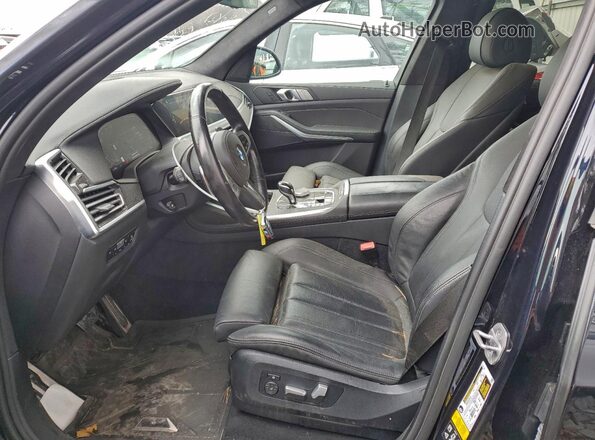 5UXCW2C03N9M16063 2022 BMW X7 Blue Вид салону спереду