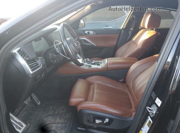5UXCY6C07N9L72635 2022 BMW X6 Black Front interior view