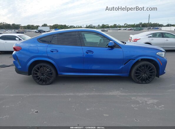 5UXCY8C05L9C66552 2020 BMW X6 Blue Вид задньої частини салону