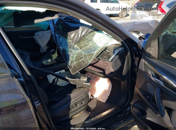 5UXKU2C30H0X48076 2017 BMW X6 Black Vista interior delantera