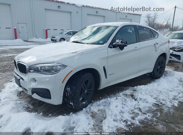 5UXKU2C55K0Z64272 2019 BMW X6 White Առջևի ձախ երեք քառորդ տեսարան