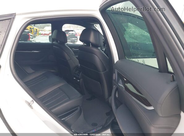 5UXKU2C55K0Z64272 2019 BMW X6 White VIN կոդի պիտակի տեսք