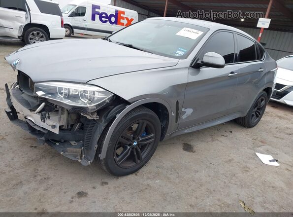 5UXKU6C57KLP60465 2019 BMW X6 Gray Առջևի ձախ երեք քառորդ տեսարան