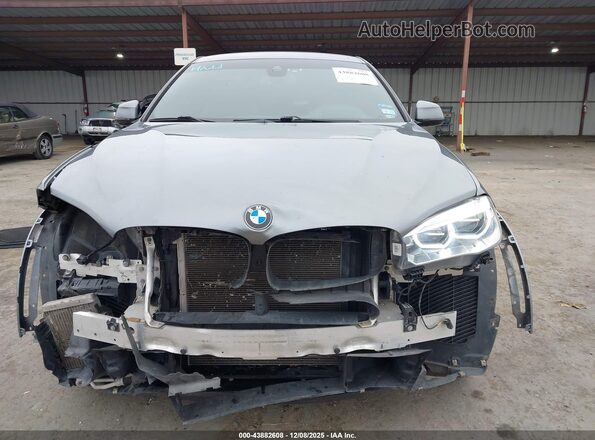 5UXKU6C57KLP60465 2019 BMW X6 Gray Սալոնի հետևի տեսք