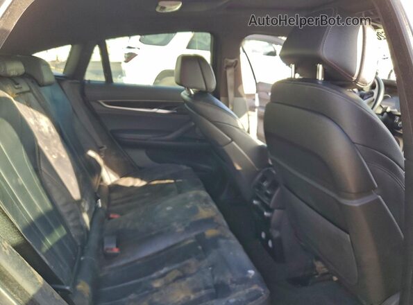 5UXKU6C58KLP60670 2019 BMW X6 White Вид задньої частини салону