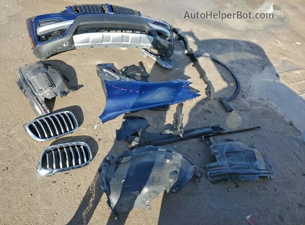 5UXTY3C00M9E60720 2021 BMW X3 Blue VIN კოდის სტიკერის ხედი