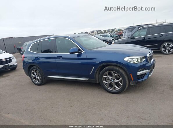 5UXTY3C01M9F54007 2021 BMW X3 Blue Вид задньої частини салону