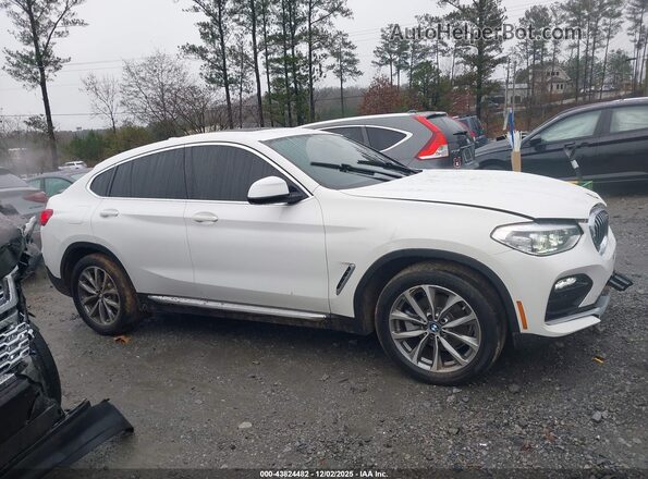 5UXUJ3C56KLG54138 2019 BMW X4 Белый Вид задней части салона