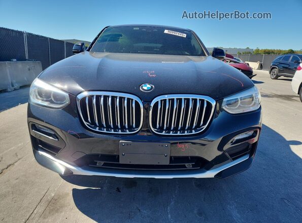 5UXUJ3C56KLG56035 2019 BMW X4 Черный Вид спереди