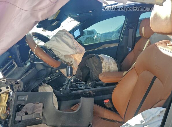 5XXG44J89RG231358 2024 KIA K5 Charcoal Vista interior delantera