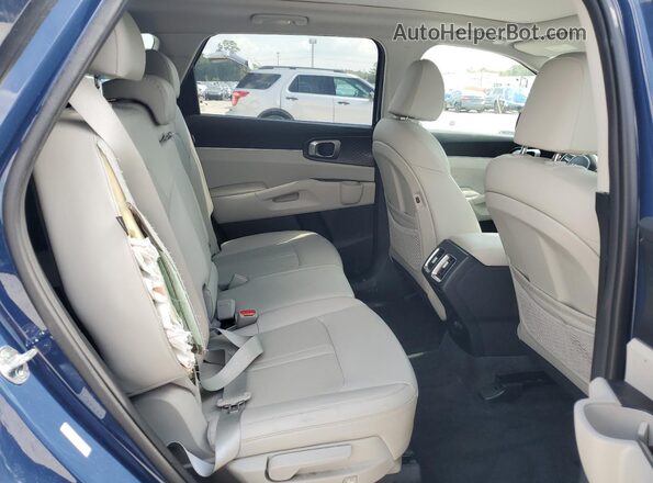 5XYRLDJC6RG293585 2024 KIA SORENTO Blue Widok wnętrza z tyłu