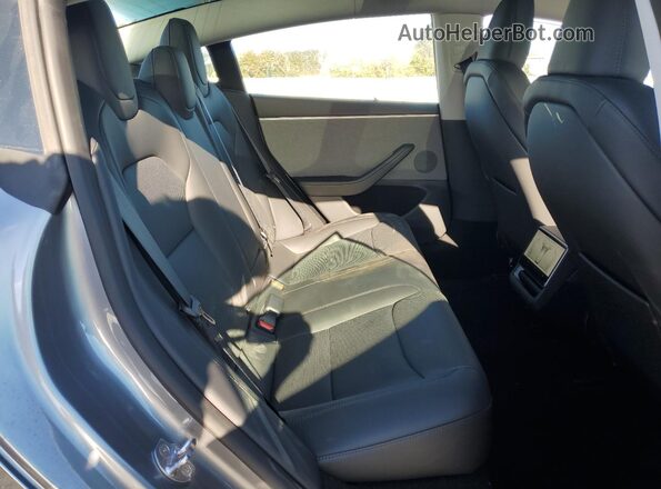 5YJ3E1EA0SF043974 2025 TESLA MODEL Silver Вид задніх сидінь