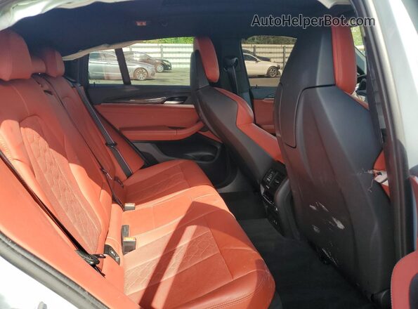 5YM23EC00P9P24079 2023 BMW X4 Gray Widok wnętrza z tyłu
