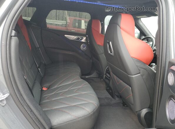 5YM33CS04R9W91052 2024 BMW XM Gray Вид задньої частини салону
