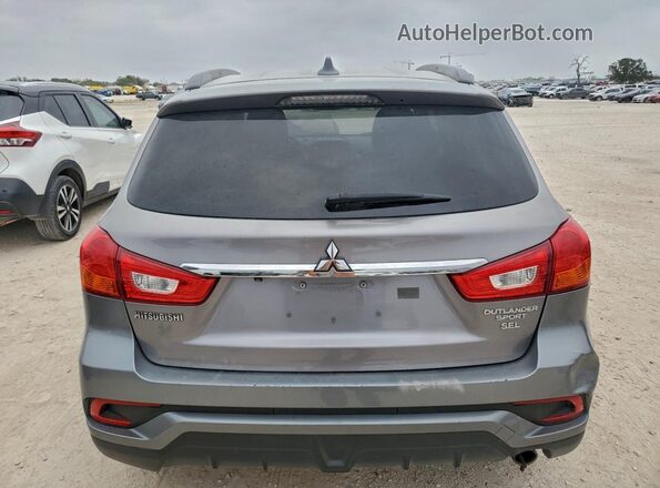 JA4AP4AW2JU002184 2018 MITSUBISHI OUTLANDER Gray წინა სალონის ხედი
