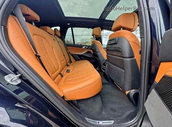 5UXJU4C05M9F77329 2021 BMW X5 Black Vista interior delantera