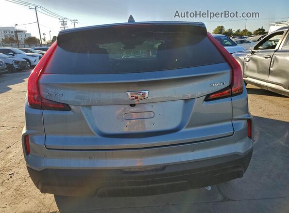 1GYAZAR45RF244379 2024 CADILLAC XT4 Серебряный 