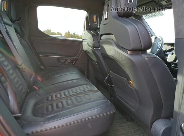 7FCTGAAA3NN006644 2022 RIVIAN R1T Maroon Vista de los asientos traseros
