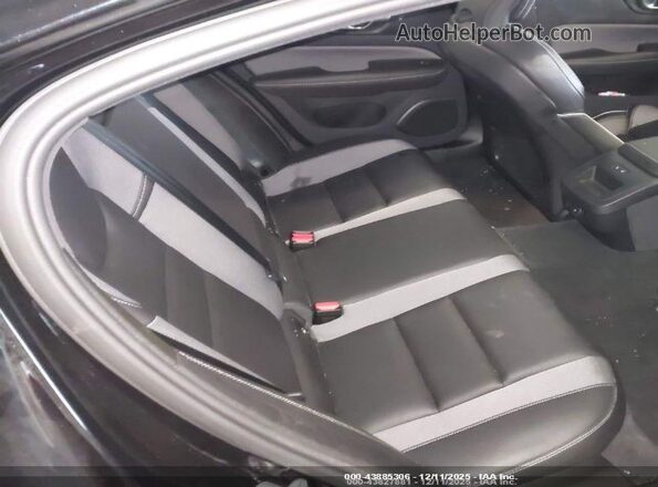 7JRL12TH8RG311124 2024 VOLVO S60 Black VIN sticker view