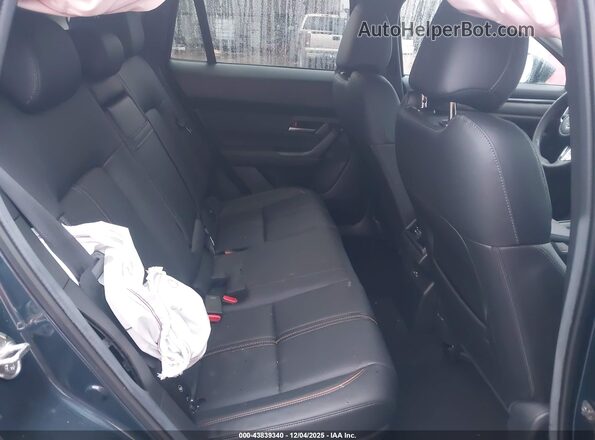 7MMVAADWXSN102502 2025 MAZDA CX-50 HYBRID Blue Vista de la etiqueta del VIN