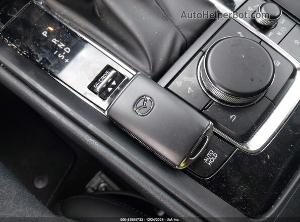7MMVAAEW8TN147275 2026 MAZDA CX-50 HYBRID Gray Vista del salpicadero