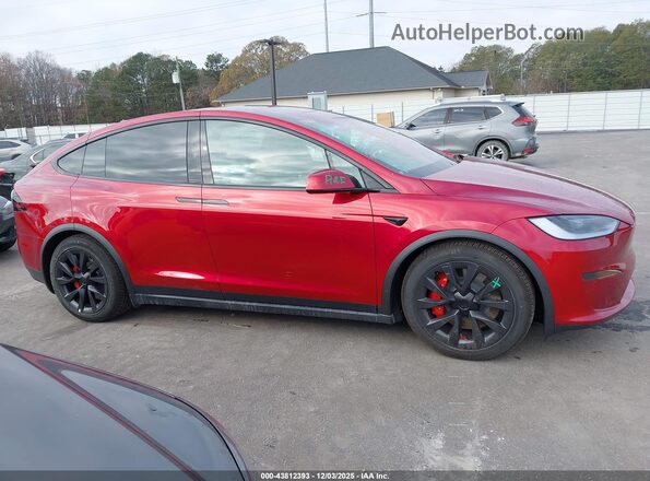 7SAXCBE61SF470043 2025 TESLA MODEL X Red Rear interior view