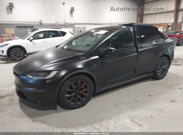 7SAXCBE6XRF460816 2024 TESLA MODEL X Black Առջևի ձախ երեք քառորդ տեսարան
