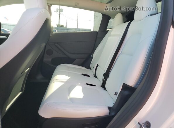 7SAYGAEE8SF244544 2025 TESLA MODEL White Հետևի նստատեղերի տեսք