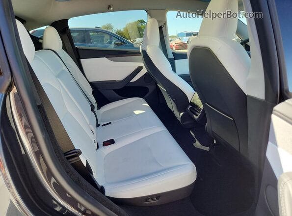 7SAYGDED7TA417963 2026 TESLA MODEL Gray Սալոնի հետևի տեսք
