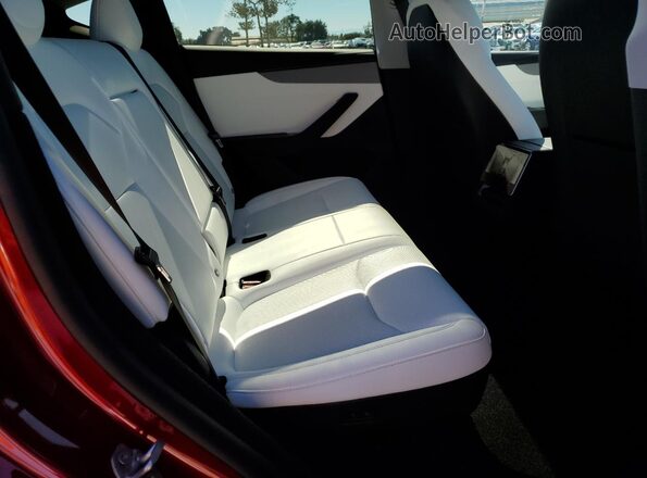 7SAYGDED7TF454711 2026 TESLA MODEL Red Vista interior trasera