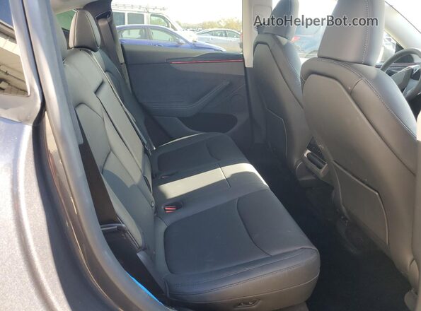 7SAYGDEE1TA384581 2026 TESLA MODEL Black Вид задньої частини салону