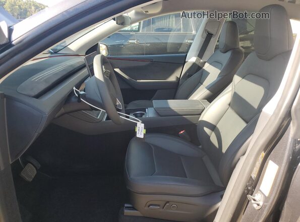 7SAYGDEE1TA384581 2026 TESLA MODEL Black Вид салону спереду