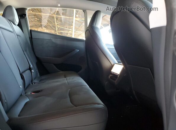 7SAYGDEE2TF321475 2026 TESLA MODEL White Սալոնի հետևի տեսք